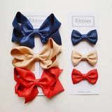 Ribbies - Extra Large Sparkly Hair Bows - Navy, Gold, and Red